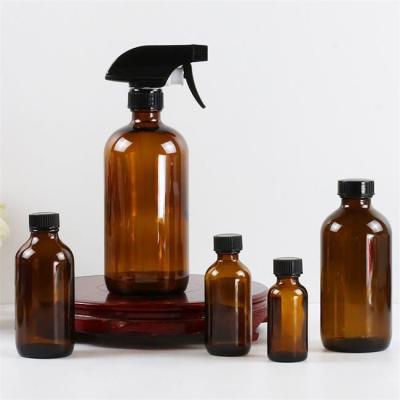 China Boston Glass Cosmetic Bottle Empty Spray Amber Glass Bottles 500ml With Screw Cap for sale