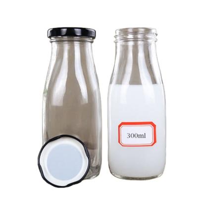 China Beverage 300ml 10oz Square Round Milk Bottle Glass Beverage Industry Use for sale