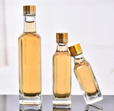 China Wholesale 30ml 50ml 100ml Mini Beverage Spirit Glass Bottle Square Liquor Bottles With Screw Cap for sale