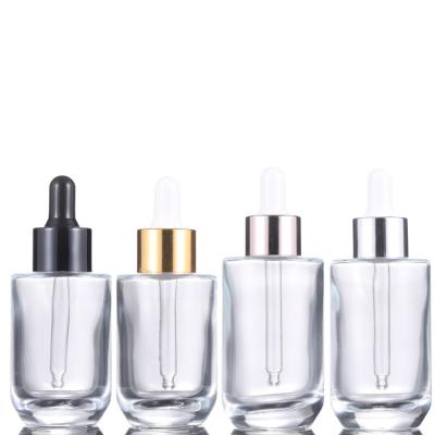 China Personal Care Essence Lotion Bottle Empty Transparent Glass Cosmetic Essential Oil Dropper Bottles for sale