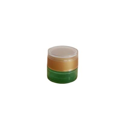 China 30g Personal Care Cosmetic Packaging Round Green Glass Cream Jar With Plastic Cap for sale