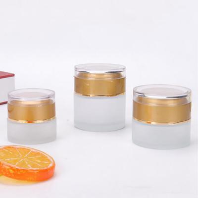 China Empty Personal Care 20g 30g 50g Skin Care Cream Jar Frosted Glass Cosmetic Jar With Gold Acrylic Lid for sale