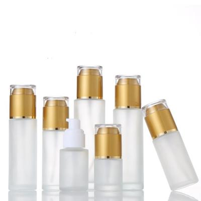 China Custom Cheap 50ml Personal Care Cosmetics Empty Bottle Frosted Glass Essence Lotion Bottle With Pump Sprayer Lid for sale