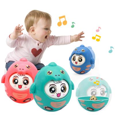 China Qilong Baby Kids Cartoon Rattle Plastic Rock Tumbler Early Educational Toys For Baby Rattle Toys With Music Sounds 10X10X12cm for sale