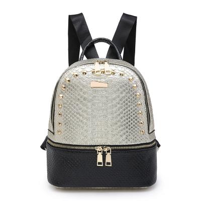 China 2020 new design waterproof girls school bags fashion snake pattern backpack metal rivet decoration backpack for sale