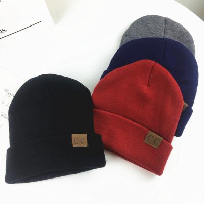 China JOINT Hot Selling Premium Quality Winter Hats Knit Beanies With Logo Leather Patch Custom Made for sale