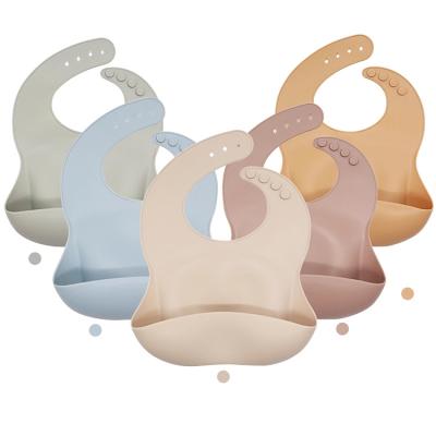 China 2021 Hot Sale Waterproof Non-Toxic Safe Antibacterial Silicone Baby Feeding Bpa Free Printed Silicone Baby Bibs for sale