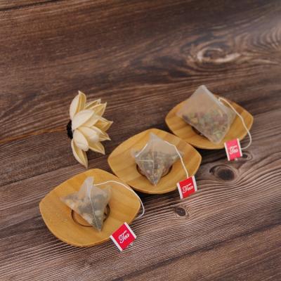 China Biodegradable Empty Tea Bag Types Mesh Fruit Tea With Triangle Pyramid Tea Bag Tea Factory for sale