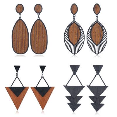 China New FASHIONABLE creative exaggerated wood earrings ladies fashion personality retro alloy wood jewelry for sale