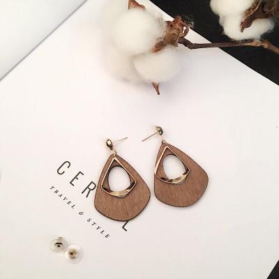 China Wholesale fashion simple wooden TRENDARY wooden long personality retro earrings earrings female for sale