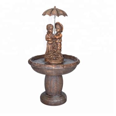 China RESIN Garden Resin Boy And Girl With Outdoor Umbrella Fountain Water Features for sale