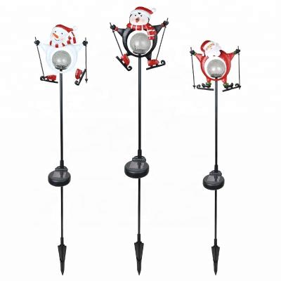 China Santa Christmas Metal Stake Lights Solar Party Favors Penguin Iron Snowman Outdoor Decoration for sale