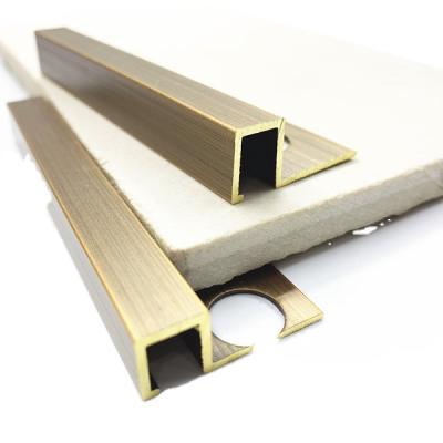 China Silver Bronze Brass Metal Square Profiles Hero Manufacturer Best Price Extruded Metal Chrome Trim Floor Profiles for sale