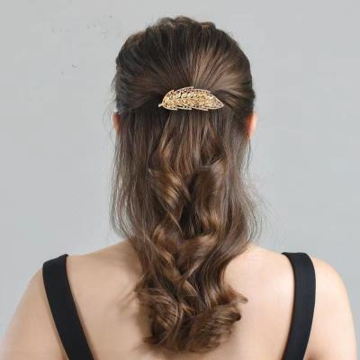 China 2022 Fashion Accessories New BLING High-Grade Crystal Hairpin Hair Accessories Big Large Feather Clip Metal Korean Metal Hairpin for sale