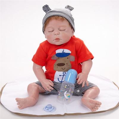 China Toy Wholesale 23 inch 58cm silicone reborn baby doll cartoon full body vinyl cheap lifelike silicone reborn for kids for sale