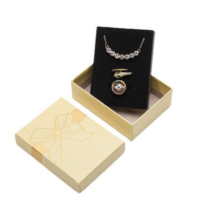 China Jewelry Packaging Ring Necklace Jewelry Packaging Box With Bowknot Cardboard Paper Trinket Box Custom Printing for sale