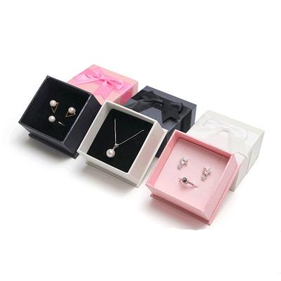 China Jewelry Packaging Pink Spot Logo Manufacturers Direct Sales Custom Bow Cardboard Paper Box Ring Necklace Pendant Jewelry Gift Box for sale