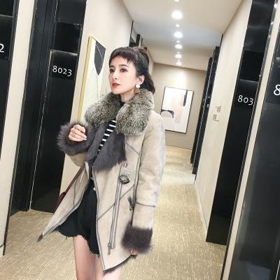 China Genuine Leather Mid Length Slim Women's Overcoat Fox Fur Collar Fit Others Winter New Haining Fur Coat Women's Fur Coat for sale