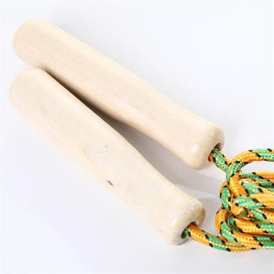 China Wholesale Custom Wooden Logo Elastic Wooden Jump Rope Cotton Handle Kids Exercise Rope Handle +cotton Skipping Rope For Kids for sale