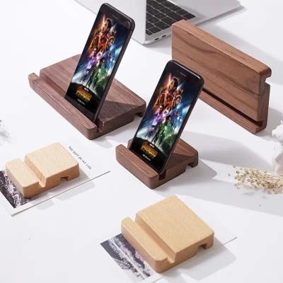 China Custom Adjustable Wooden Bamboo Cell Phone Holder Stand Manufacturing Display Stand for Phone and Tablets Phone Stand with Custom Logo for sale