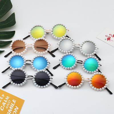 China Newest Luxury Luminous Fashion Pearl Handmade Sunglasses Round Eye Shades Glass Kids Creative Round Sunglasses for sale