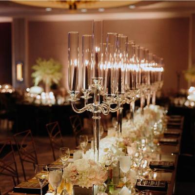 China Cheap modern tall glass crystal wedding ware candelabra 5 pcs candle holder table decorations centerpieces for sale for sale