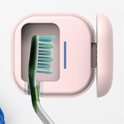 China Mini Portable Electric Toothbrush UV-C Light Holder UV Light Sterilization Toothbrush Moving Sterilizer for sale