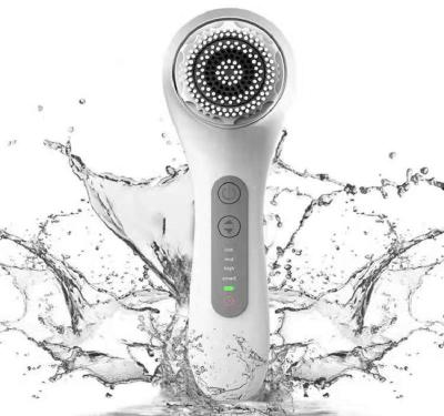 China Mini Electric Silicone Face Brush Massager Dock Facial Cleansing Brush Cordless Lovely Silicone Facial Massager for sale