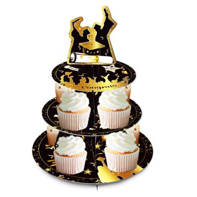 China Huancai 2022 Disposable Graduation Cake Stand Black Gold 3 Tier Cupcake Stand Holder Party Decorations For Congratulations Graduate Party Supplies for sale