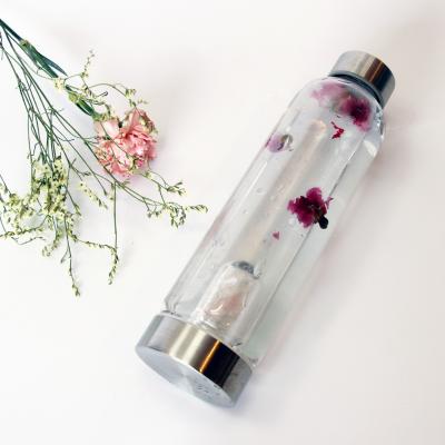 China Sustainable Bamboo Water Bottle Crystal Water Bottle Bamboo Lid 20Oz Crystal Water Bottle for sale