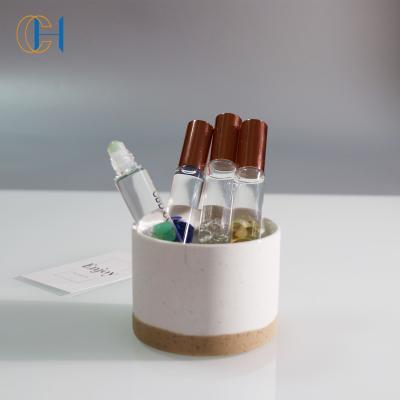 China Luxury Modern Skin Care Accessories Natural Quartz Roller Ball Crystal Essential Oil Roller Bottle for sale