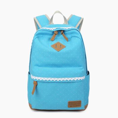 China Custom Polka Dot Bag New Design Brand Name Child Zipper Backpack Canvas Girls Backpack School Bag for sale