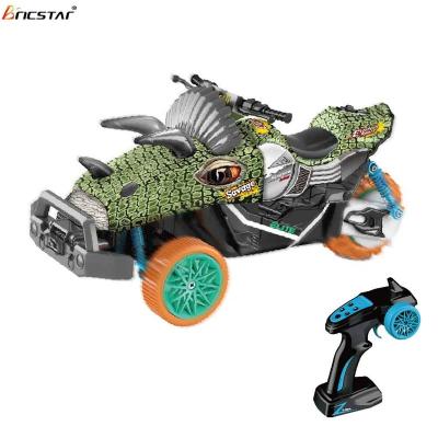 China Lighting Bricstar design kids rc motorcycle unique outdoor toy 2.4G spray three-wheeled RC monster motorcycle with light music for sale