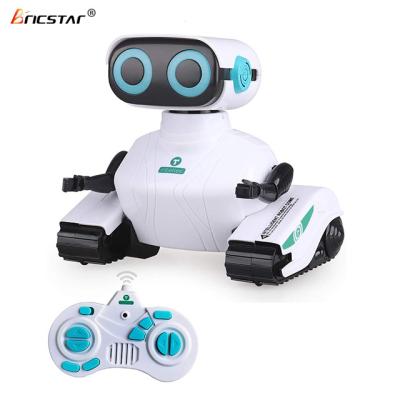 China Eco-friendly 2.4G music material smart remote control dancing novelty Bricstar intelligent robot, led eyes rc walking robot for sale