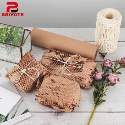 China Biodegradable Eco Friendly Kraft Paper Roll Brown Honeycomb Wrapping Wrapping Kraft Paper Roll for sale