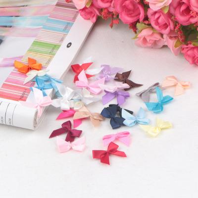 China 100% Polyester Small Mini Ribbon Bow for Customized Underwear Decoration Custom Sizes for sale