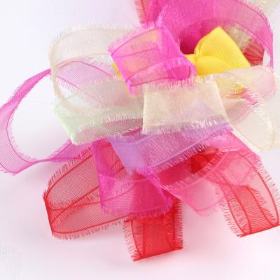 Cina Disegnatore a doppio lato larghezza 16 mm Organza di seta sari coreana Chiffon Fringe Tassel Ribbon in vendita