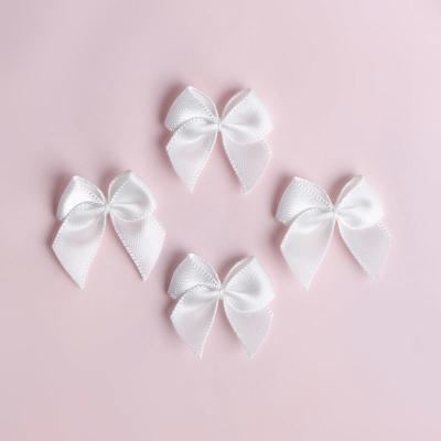 Cina Decorazione di biancheria intima 22*23mm Satin Ribbon Bow con disegno pre-fatto in vendita