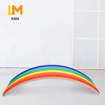 China Indoor custom diy logo pattern wooden curvy rainbow shimmy yoga kids balance board for sale