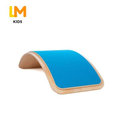 China Custom Montessori Indoor Wooden Rainbow Shimmy Logo Rocker Arch Surf Anti-Skid Balance Board for sale