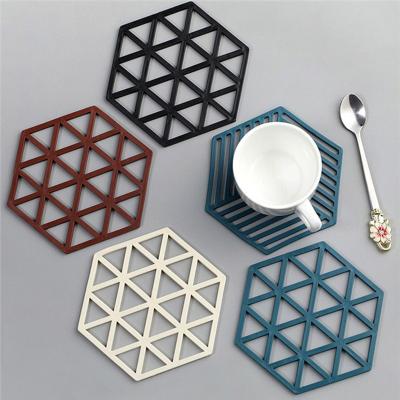 China Sustainable Creative Hexagonal Hollow Bowl Pad Non Slip Teapot Coaster Household Cup Mat for sale