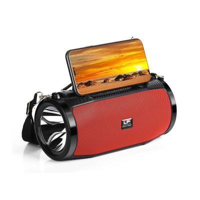 China Hot Selling High Quality Portable Solar Torch Speaker Wireless Charger LP Wireless Speakers for sale