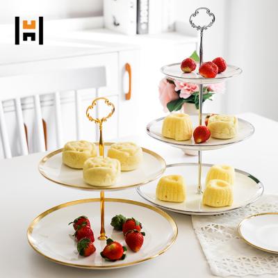 China Viable Gold Ceramic Cake Stand Porcelain Cup Cake Stand With Gold Rim For Wedding Gift for sale