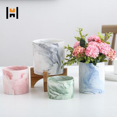 China Eco-friendly high quality simple indoor table top ceramic marble pot with wooden stand for plant/flower for sale