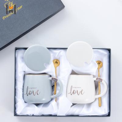 China Stored Creative Constant Temperature Cup Mug With Ceramic Cup Household Lid Spoon Coffee Hot Coffee Mug for sale