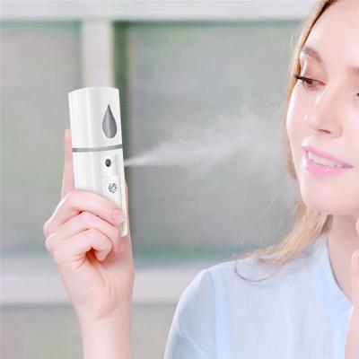 China USB Rechargeable Mist Mini Nano Handy Mist Spray Mini Beauty Instrument Face Moisturizer Spray for sale