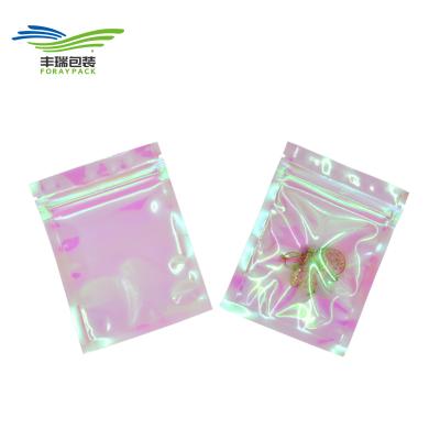 China Glossy Holographic Barrier Rainbow Foil Zip Lock Plastic Packaging Bags for sale