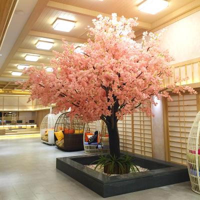 China Durable romantic rose decoration to hug the Artificial Cherry Blossom Tree background for sale