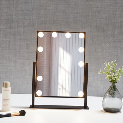 China Stainless Steel Framed Standing Black Frame Small Rectangle LED Bthroom Illuminated Mirror With Shelf for sale