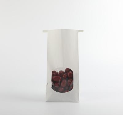 China BIODEGRADABLE tin tie bag kraft paper food packaging gor snack nuts for sale